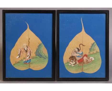 A pair of 19th century Chinese gouache painting on Bodhi leaves, each depicting a Lohan, in matching glazed frames (22x16.5cm