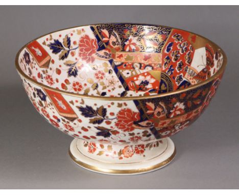 A Ridgway circular deep bowl decorated in the Imari style, on short pedestal foot; 27cm dia.