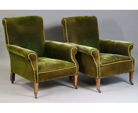 A pair of late 19th/early 20th century armchairs, upholstered in green velor, on mahogany square tapering legs with ceramic c