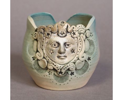 MARIA PAPADEMETRIOU (20th century), a ceramic small vase with relief mask to one side, signed &amp; dated 1987, 9.5cm high.