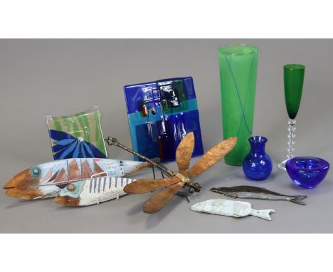 Two ‘folk art’ carved &amp; painted models of fish; two ceramic models of fish; a metal dragonfly; a Kosta Boda tall green ar