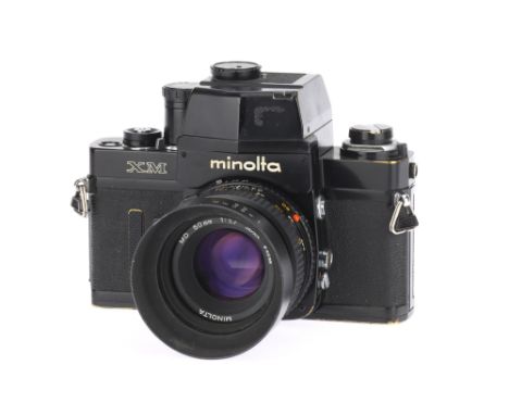 A Minolta XM 35mm SLR Camera black, circa 1973, serial no.2127819, with a MD f/1.7 50mm lens, shutter fault, works on B only,