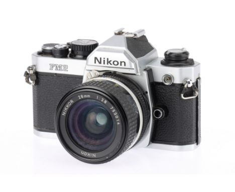 A Nikon FM2 35mm SLR Camera chrome, 1983-85, serial no.7041939, with a Nikkor f/2.8 28mm AI-S lens, shutter working but cappi