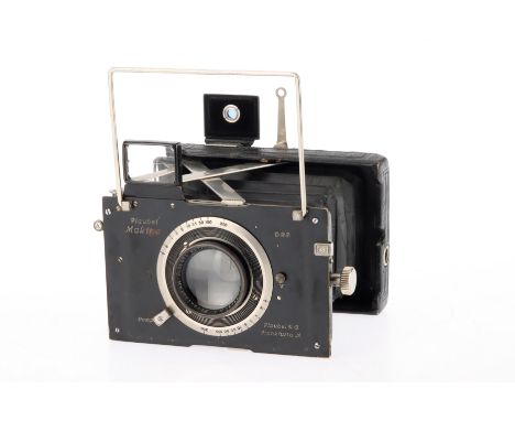 A Plaubel Makina Medium Format Folding Strut Camera, black, body F, shutter not working, with an Anticomar f/2.9 10cm lens, o