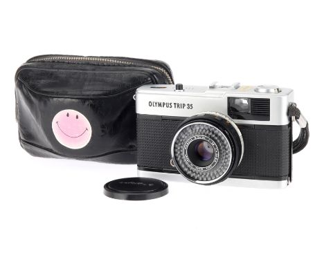 An Olympus Trip 35 35mm Viewfinder Camera, chrome, body G-VG, shutter working, aperture blades stuck, with strap, front cap, 