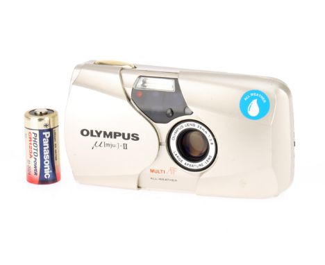 An Olympus mju II Ultra Compact 35mm Camera Champagne, circa 1996, serial no.4519923, with Olympus f/2.8 35mm lens, powers up