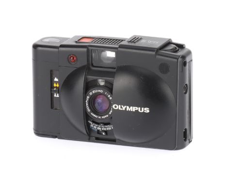 An Olympus XA-2 Compact 35mm Camera black, circa 1980, with a D.Zuiko f/3.5 35mm lens, untested, body F, some battery corrosi