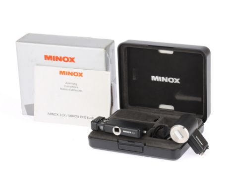 A Minox ECX Subminiature Camera Set black, withca Minar f/5.6 15mm lens, shutter sticking, body VG, lens VG, with Minox ECX-F