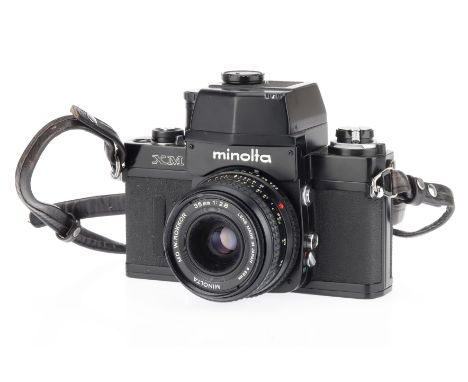 A Minolta XM 35mm SLR Camera black, c.1973, serial no.2120635, with a MD W.Rokkor f/2.8 35mm lens, shutter fires at B and X, 