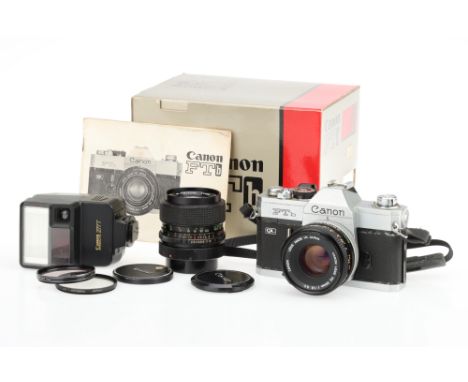 A Canon FTbn QL 35mm SLR Camera chrome, date code 1977, serial no.602909, with an FD f/1.8 S.C. 50mm lens, serial no.567670, 