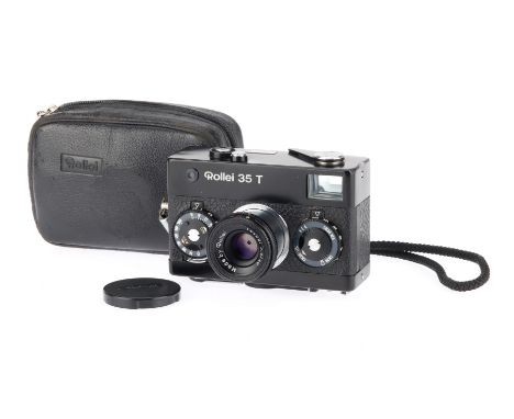 A Rollei 35 T 35mm Viewfinder Camera, black, body G, shutter working, sticks on speeds 1/15s &amp; slower, single screw missi