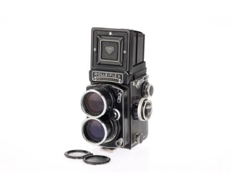 A Rollei Tele-Rolleiflex Medium Format TLR Camera, black, serial no. S 2303810, body F-G, shutter working, shutter speed sele