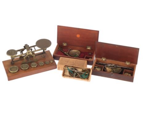 Collection of Small Scales, including a small set of desktop letter scales on a mahogany base, a small set of brass scales in