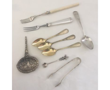 Including: Georgian silver teaspoon, silver pickle fork, silver sugar tongs & a mustard spoon with a 'windmill' with revolvin