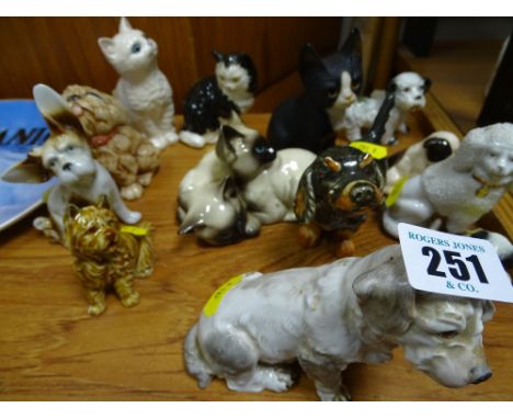 Dresden china dog figure plus other cats and dogs including Beswick, Goebel, Doulton etc