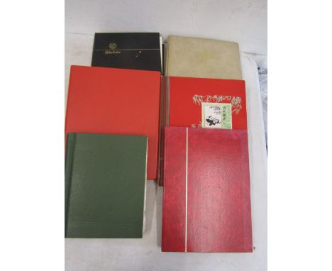 6 stamp albums- Around the world-&nbsp; Germany, New Zealand, Italy, Royal Wedding, one empty album&nbsp;