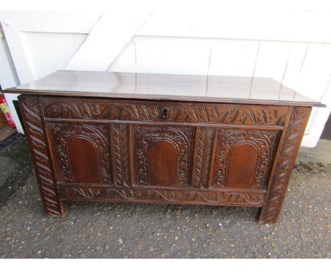 A 16thC carved oak coffer with candle box 133cmW 47cmD 62cmH