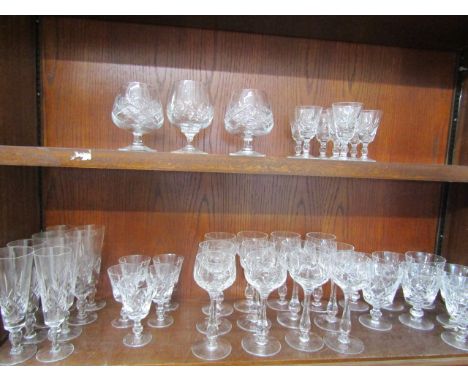Stuart crystal glasses part suite comprising 8 flutes, 3 brandy, 5 small wine, 7 large wine (one chipped), 7 liquor, 12 stemm
