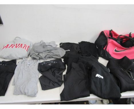 Sports wear inc Under Armour and Next in various sizes in pink Nike bag