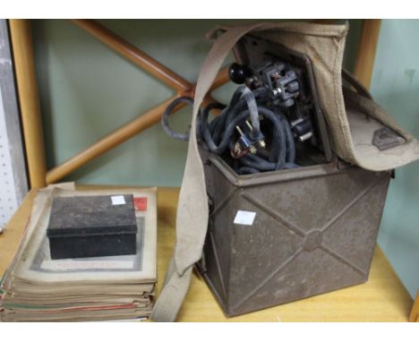 A military "Lamp signalling daylight short range" device, with morse key, in original box, and some wireless magazines