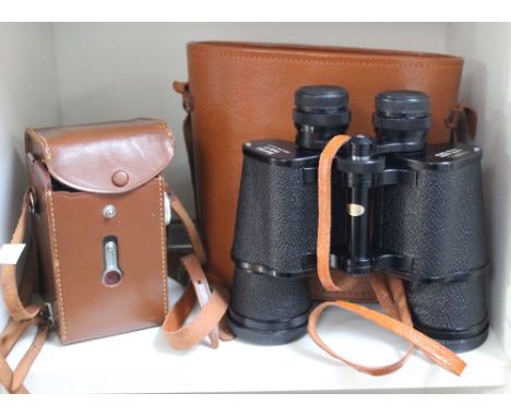 A boxed set of Consul 10 x 50 binoculars, together with Halina AI camera in case