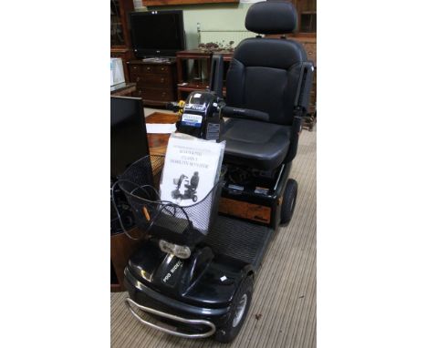 A Pro-Rider Delux Class 3 Road King mobility scooter, with charger &amp; instructions