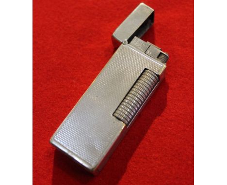 A "Dunhill" silver plated lighter