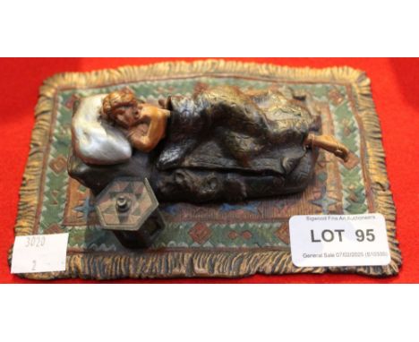 After Franz Bergmann, cold painted bronze, girl asleep on a day bed, removable cover, carpet ground 16cm x 10cm, marks to bas