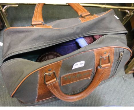A set of Lawn Green bowls in a Welkin bag
Additional info: Seven bowls "Hemselite" Australia made, including Classic II, and 