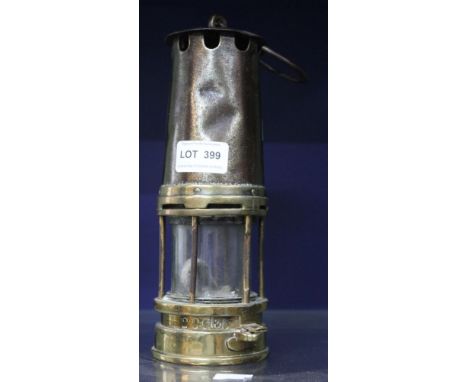 An original brass miners lamp