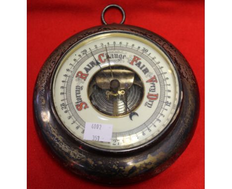A silver mounted barometer