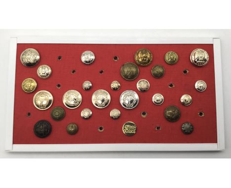 A good selection of 19th and 20th century brass, gilt, and anodised British cavalry and guards regiments tunic buttons. To in