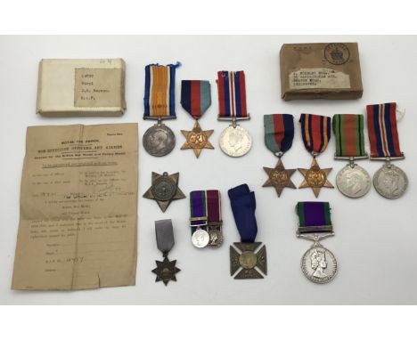 A selection of British medals / medallions. To include: a WW1 British War Medal, card box of issue, and receipt slip, awarded