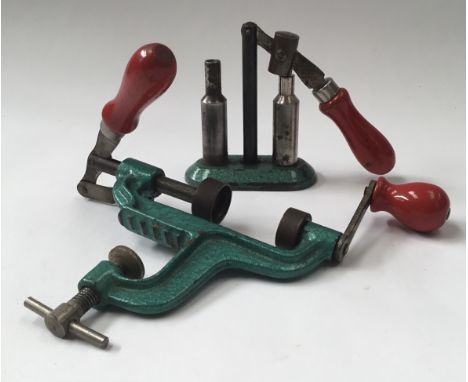 Modern 12bore shotgun cartridge manual de/re-capping tool in steel with matching manual roll-turn-over tool. Modern working r