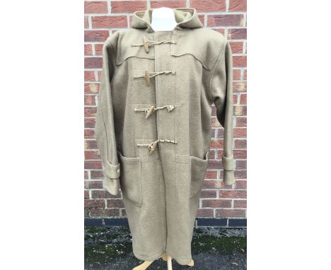 A late WW2 era Royal Navy woollen duffle coat. Complete with the correct later 4 straps / toggles to the front, and with the 