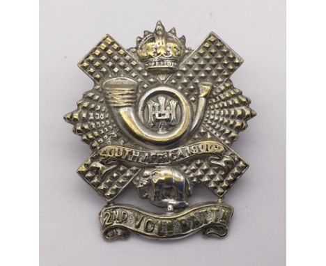 A good early 20th century die cast silver plated cap badge for the 2nd Volunteer Battalion Highland Light Infantry, with make