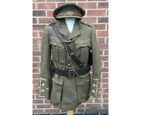 A superb and scarce, WW1 Lieutenant’s tunic, matched trousers, Cap, Sam Brown belt, boots, and other associated equipment, as