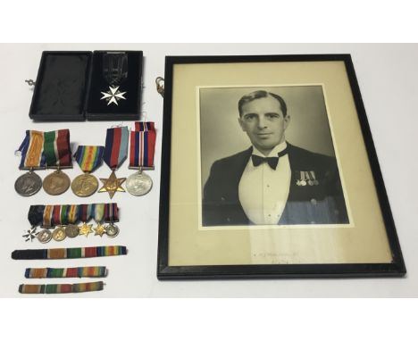An Order of St John, WW1 / WW2 Merchant navy group, awarded to Leopold Horace Fudge. To include: a cased post 1936 Officer of