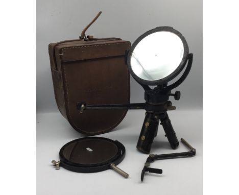 An interwar / WW2 era British 5’’ MK.V Heliograph signal mirror, with original leather carry case.Made from blackened brass a