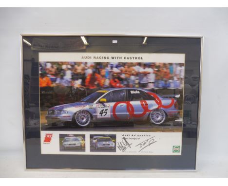 A large framed and glazed Castrol/Audi promotional poster/print titled 'Audi Racing With Castrol', depicting an Audi A4 Quatt