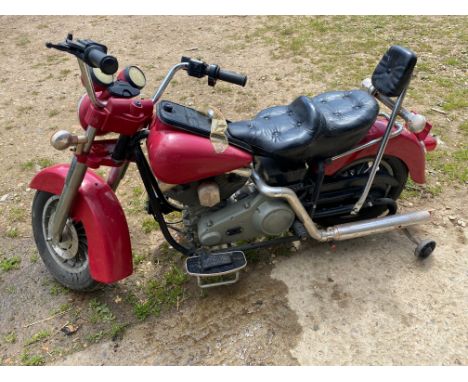 A child's electric toy motorbike based on a Harley Davidson.