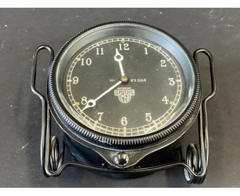 A Smiths black faced rim wind eight day car clock, appears in restored condition. 
