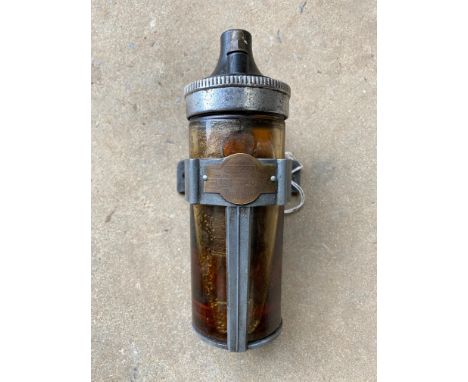 A Runbaken oil filled coil with bracket. 