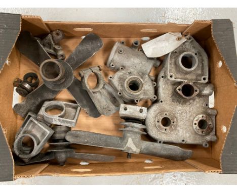 A Riley four bladed fan, plus a two bladed fan with chips, and mounting bracket, also a timing chest cover. 