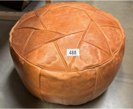 A leather pouffe