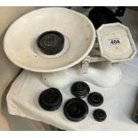 A set of cast iron kitchen scales & weights