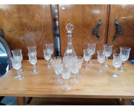 A glass decanter with silver plated neck &amp; a selection of glasses