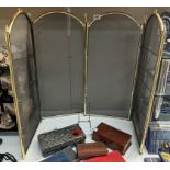 A brass plated & black mesh 4 fold fire screen