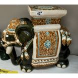 A large pottery elephant garden stool / plant stand