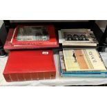 A collection of Lowry related books and an album of Lowry related postcards